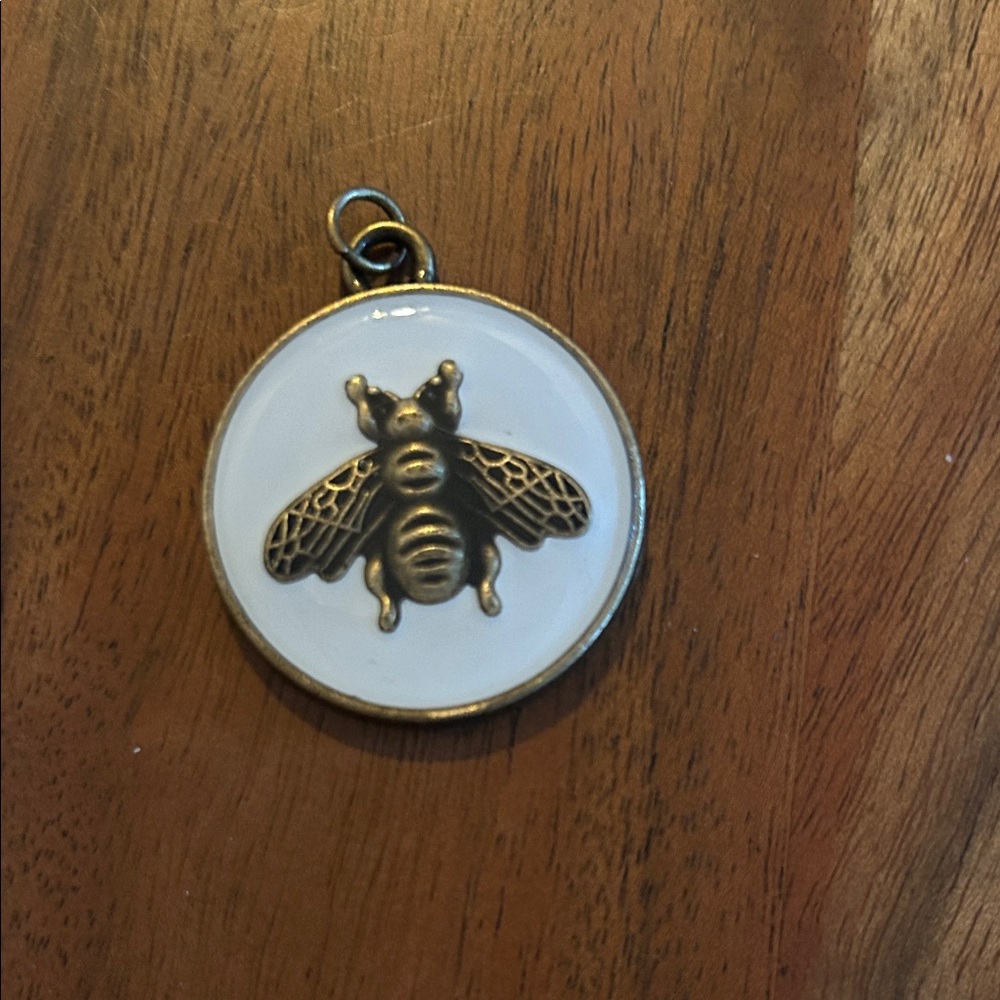 Gold Bee Pendant on White Background